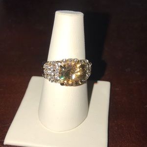 Gold ring with orange center stone